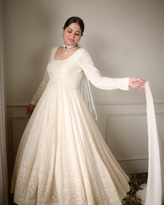 KAIRA'S OFF WHITE BADLO DESIGNER READYMADE GOWN SUIT SET .