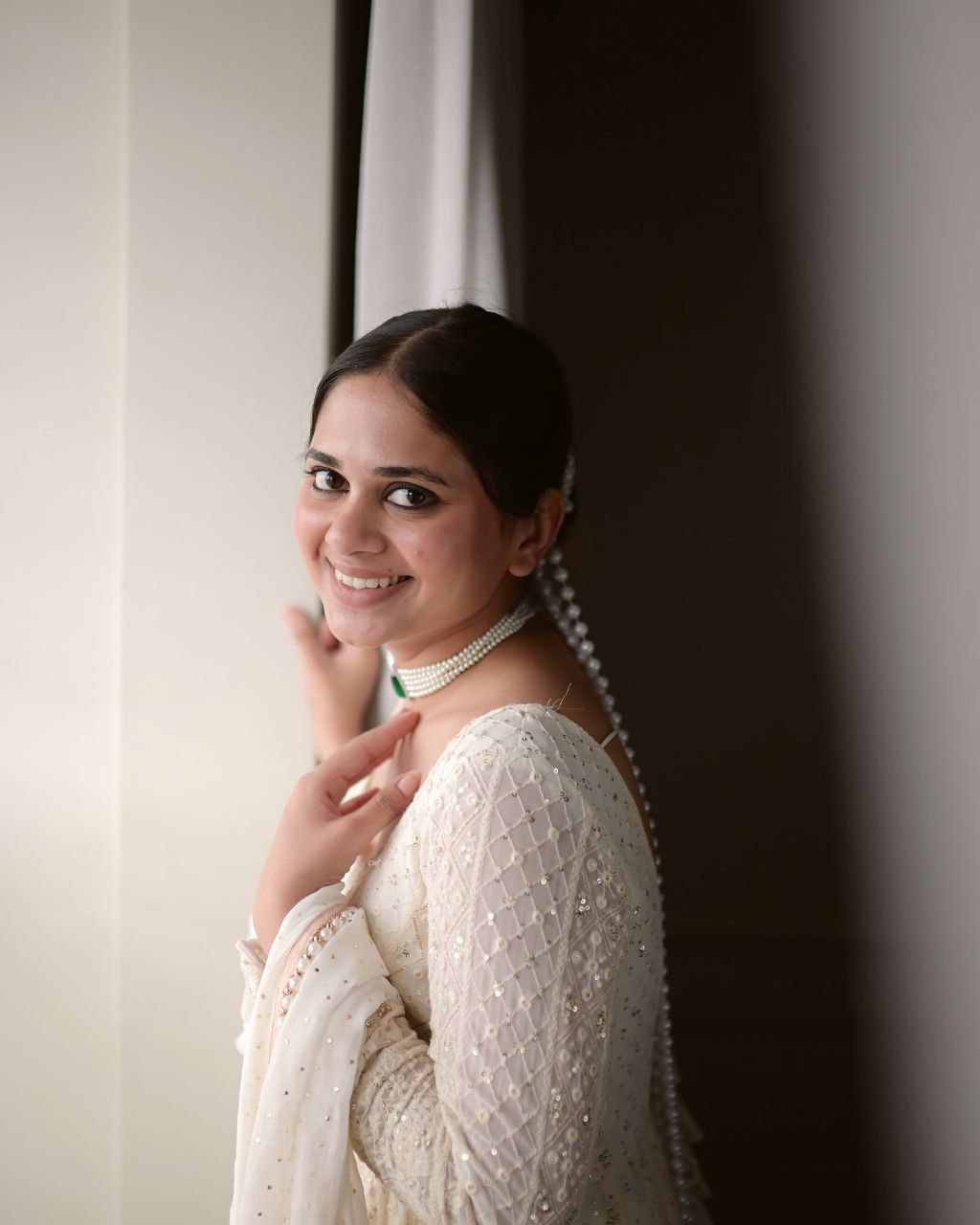 KAIRA'S OFF WHITE BADLO DESIGNER READYMADE GOWN SUIT SET .