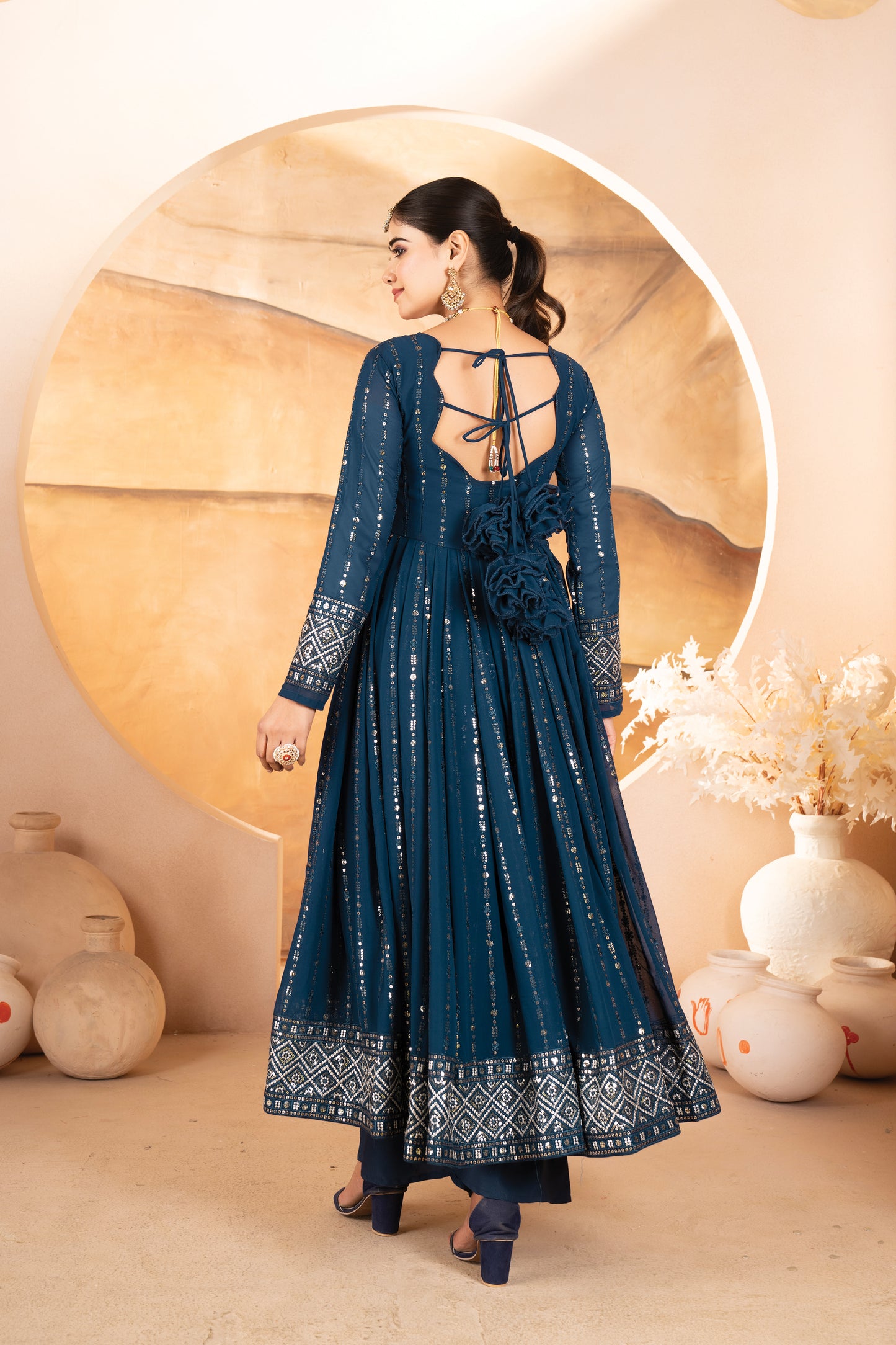 RAKHI'S RAMA COLOURED ANARKALI SUIT SET.