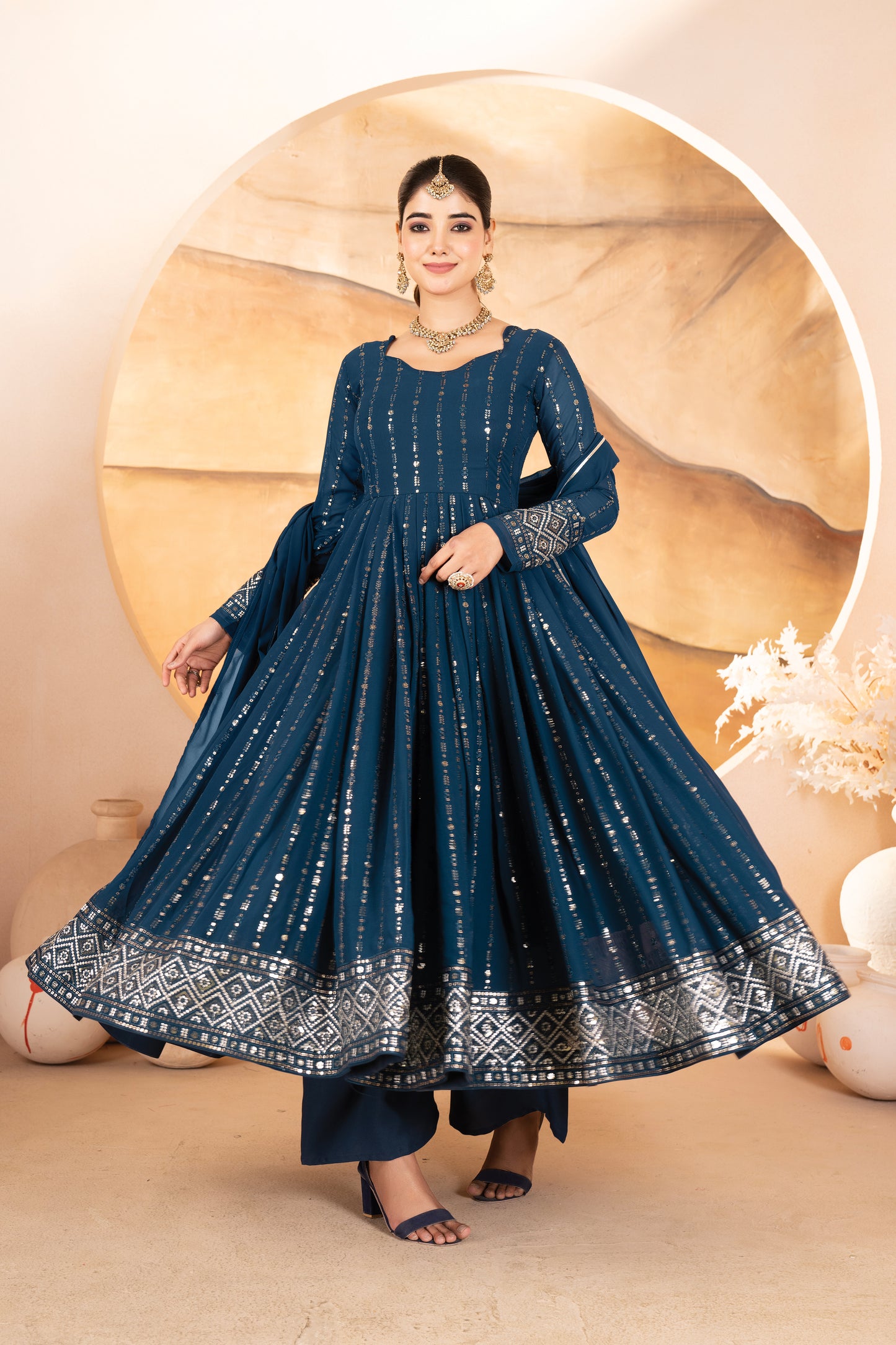 RAKHI'S RAMA COLOURED ANARKALI SUIT SET.