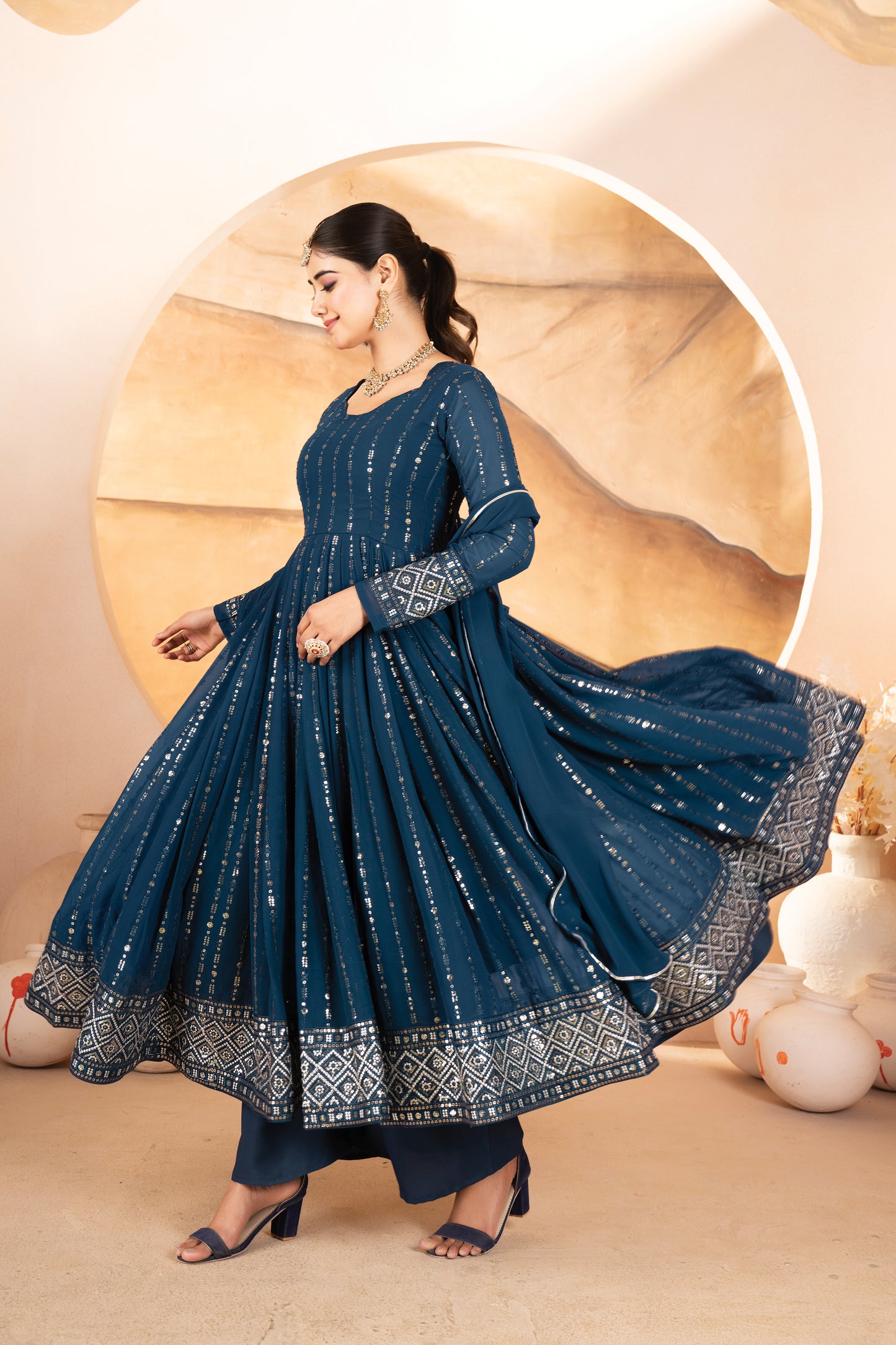 RAKHI'S RAMA COLOURED ANARKALI SUIT SET.