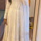 KINJU'S WHITE COLOURED ANARKALI SUIT SET.
