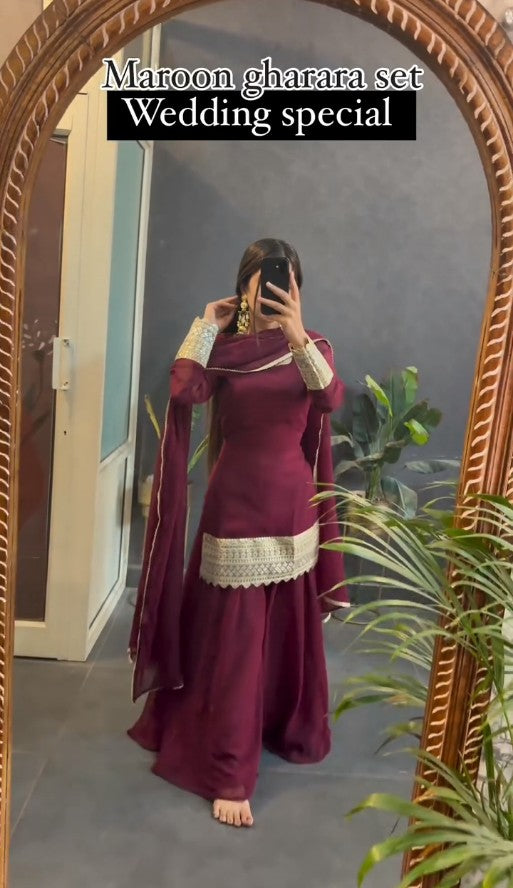 Kaira's Off Maroon Designer Readymade Gown Suit Set .